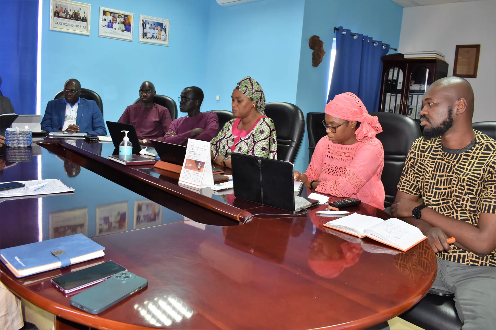 Participants around a conference table