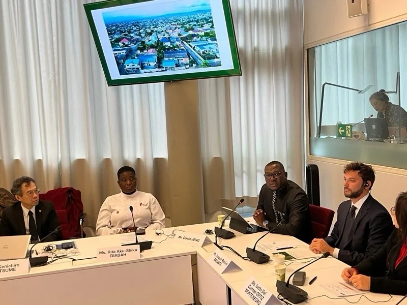 Participants around a conference table