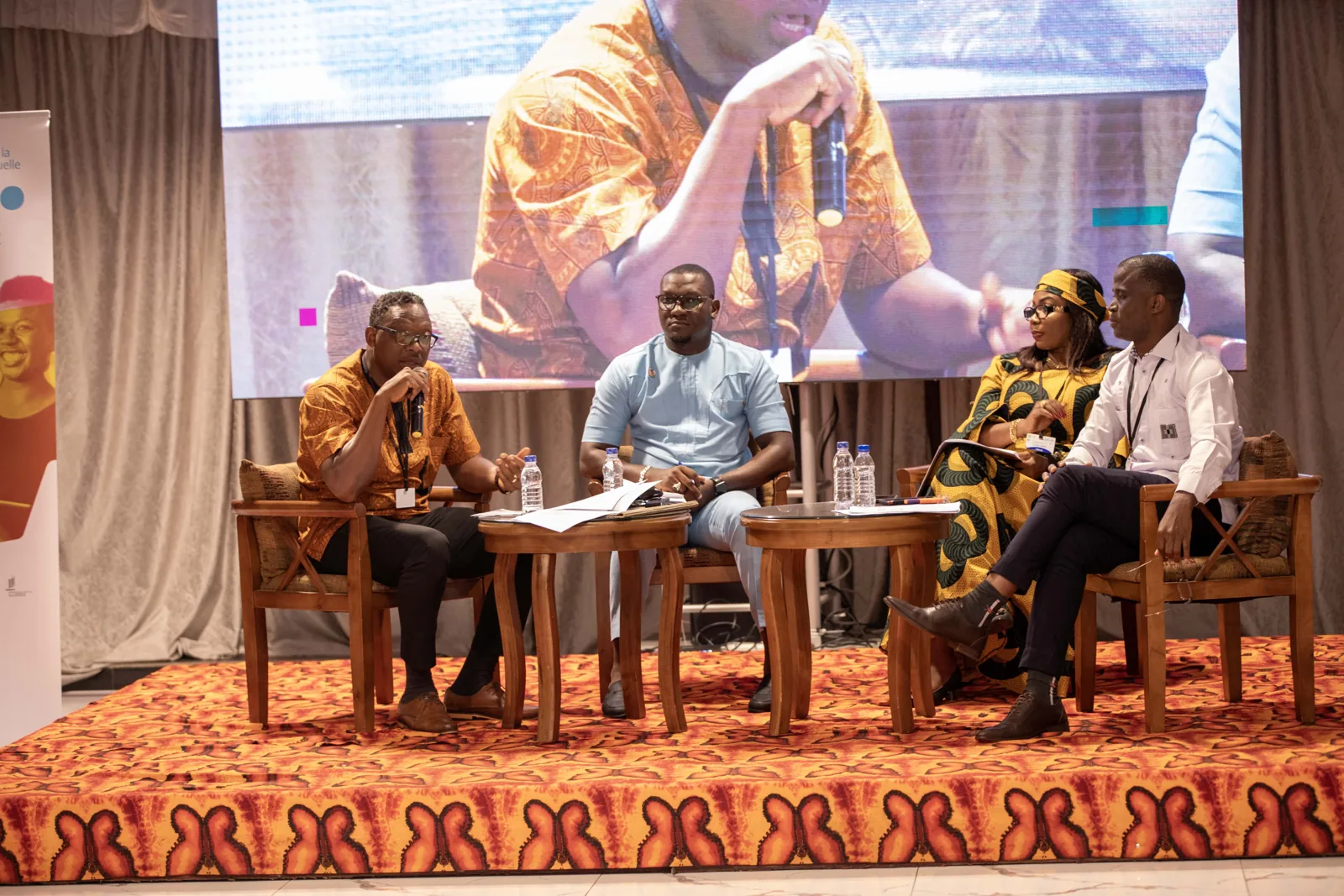 Panelists at a conference event