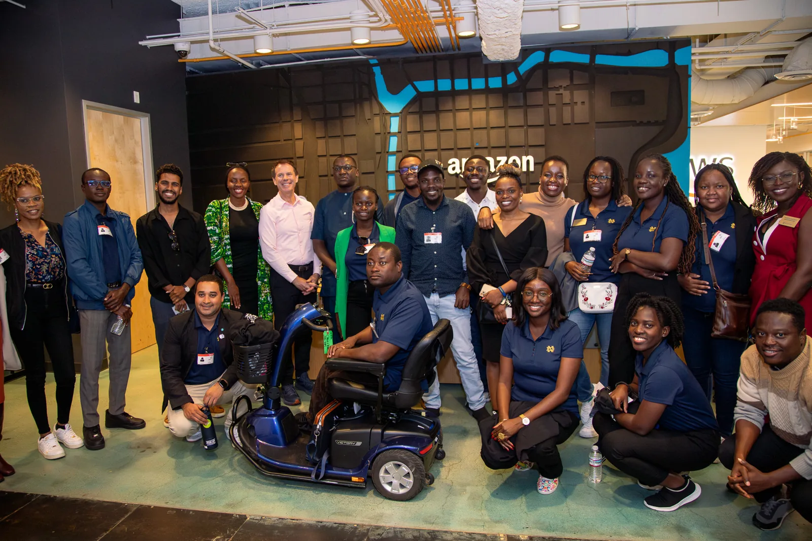 A group standing together at an indoor venue