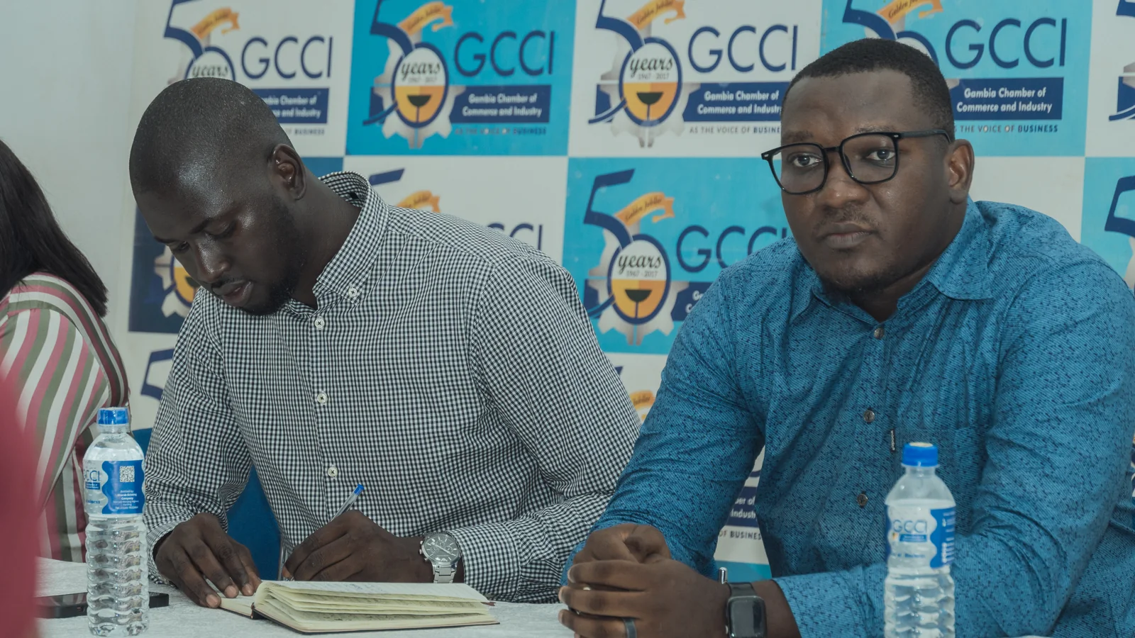 David Jeng seated with participants at a GCCI meeting