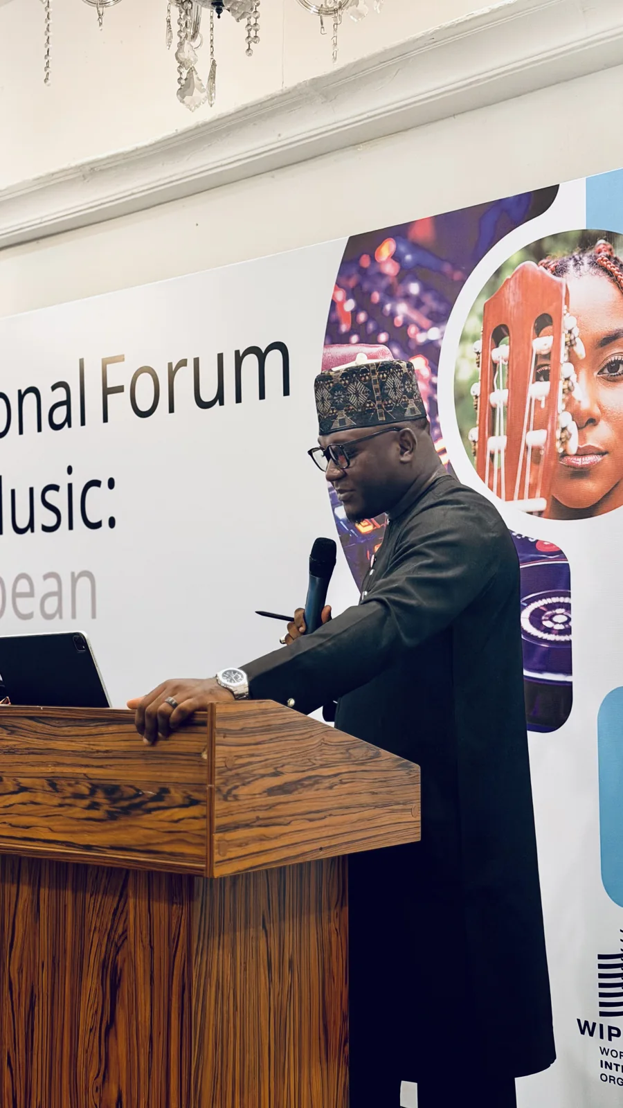 A speaker addressing the forum