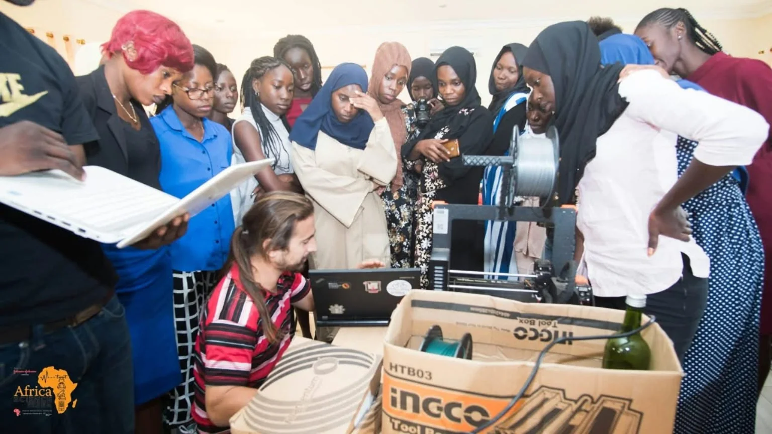Participants gathered around a practical technology demonstration