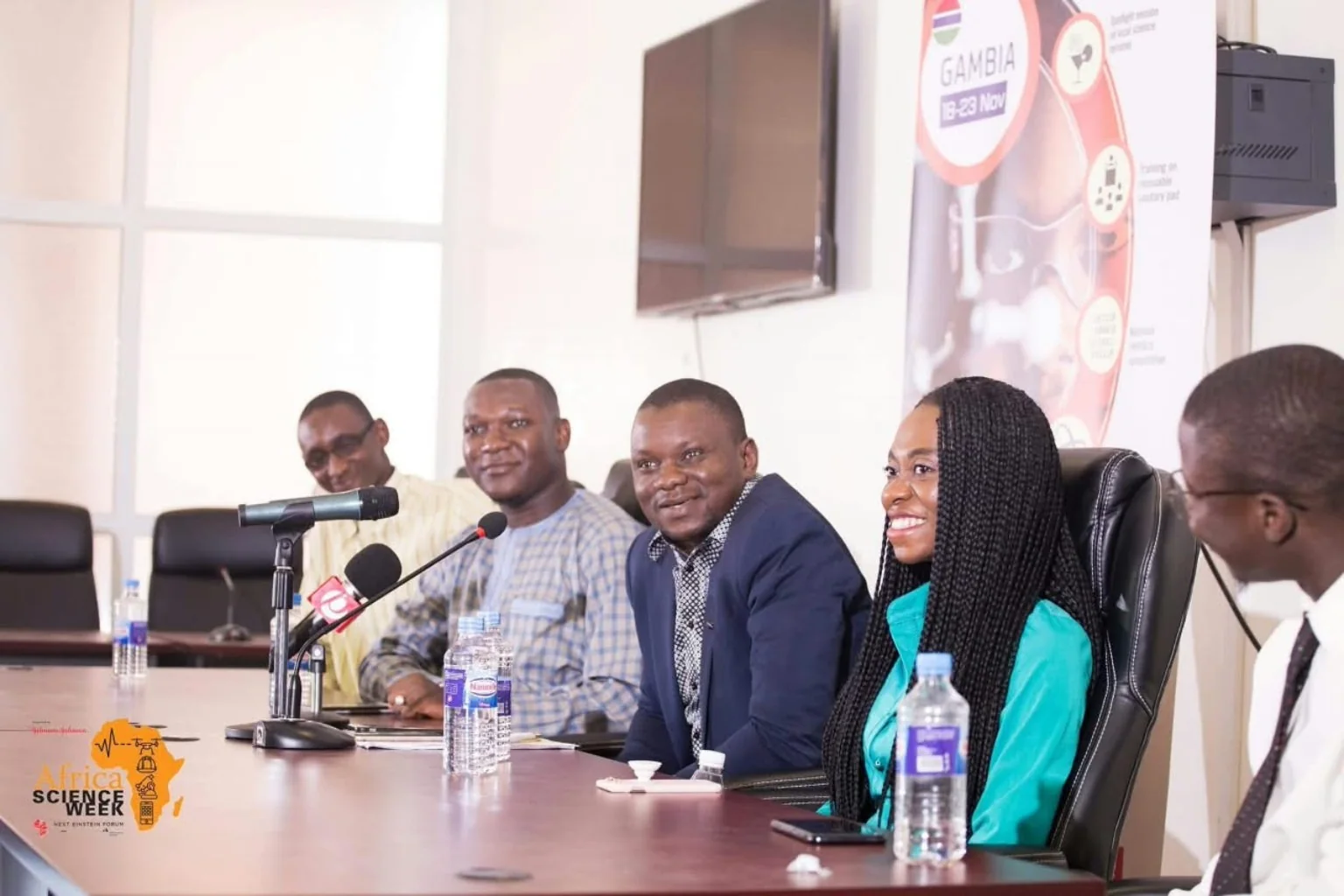Panelists seated at the Africa Science Week discussion table